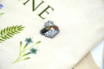 Пін (значок) Bookopt Be the light you wish to see in the world. Зображення №3